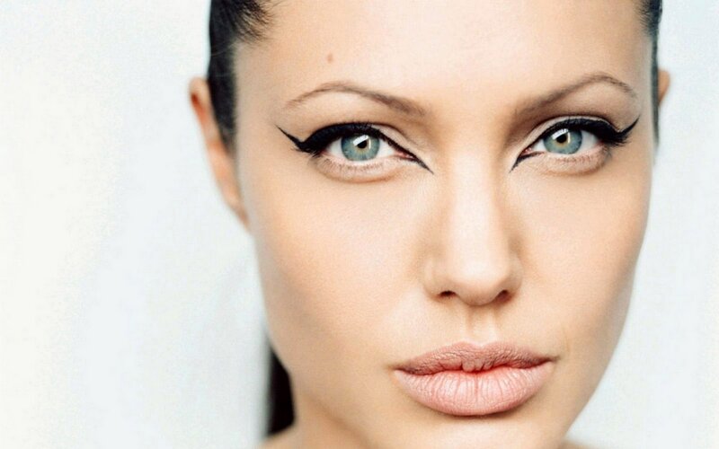 Woman with Winged Eyeliner — White, Neutral, Photograph, Eyes