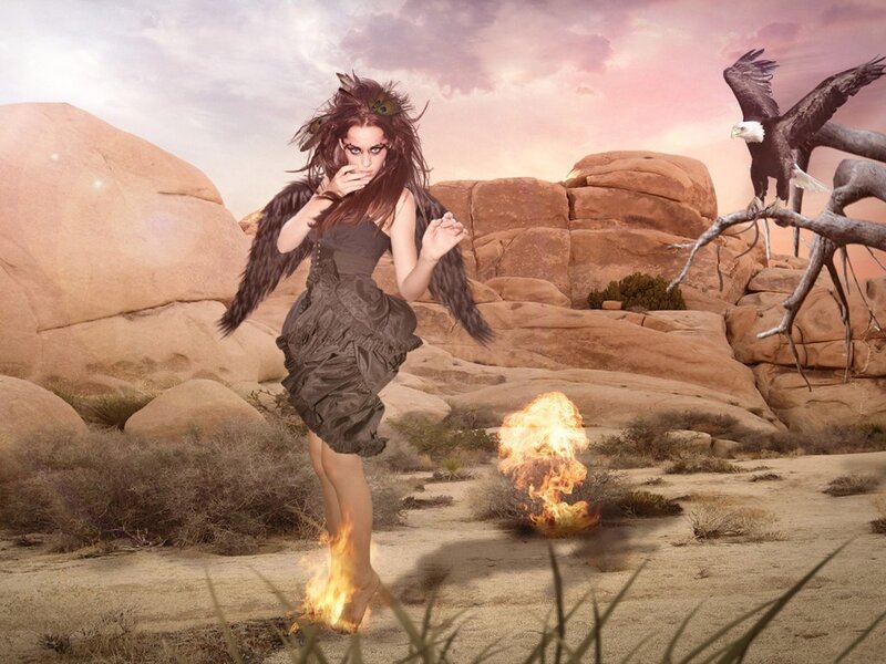 woman with wings in desert