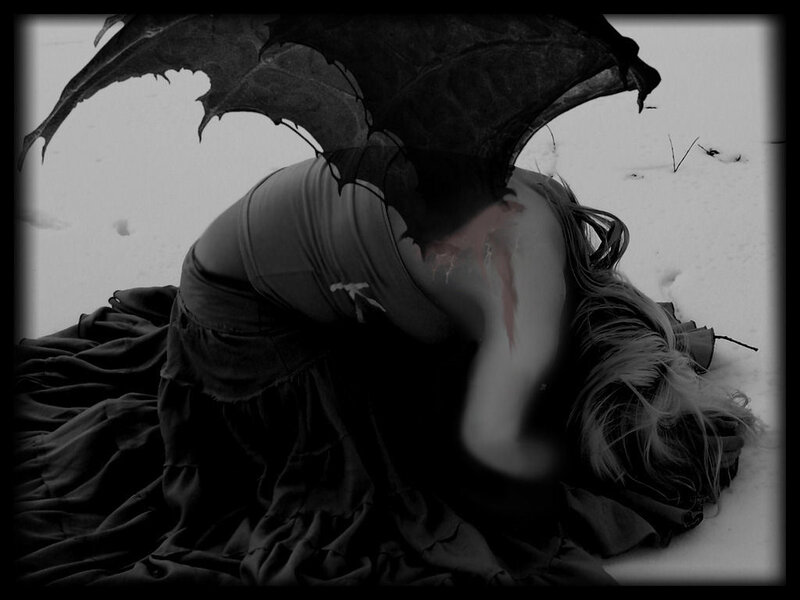 woman with wings in snow