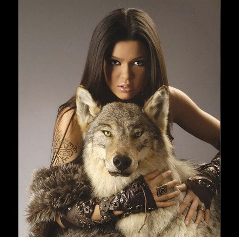woman with wolf companion
