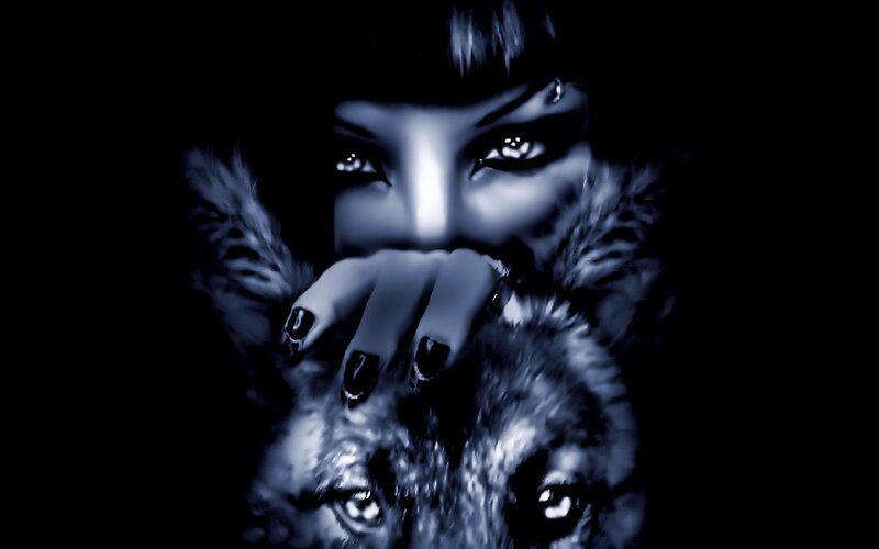 woman with wolf in dark scene