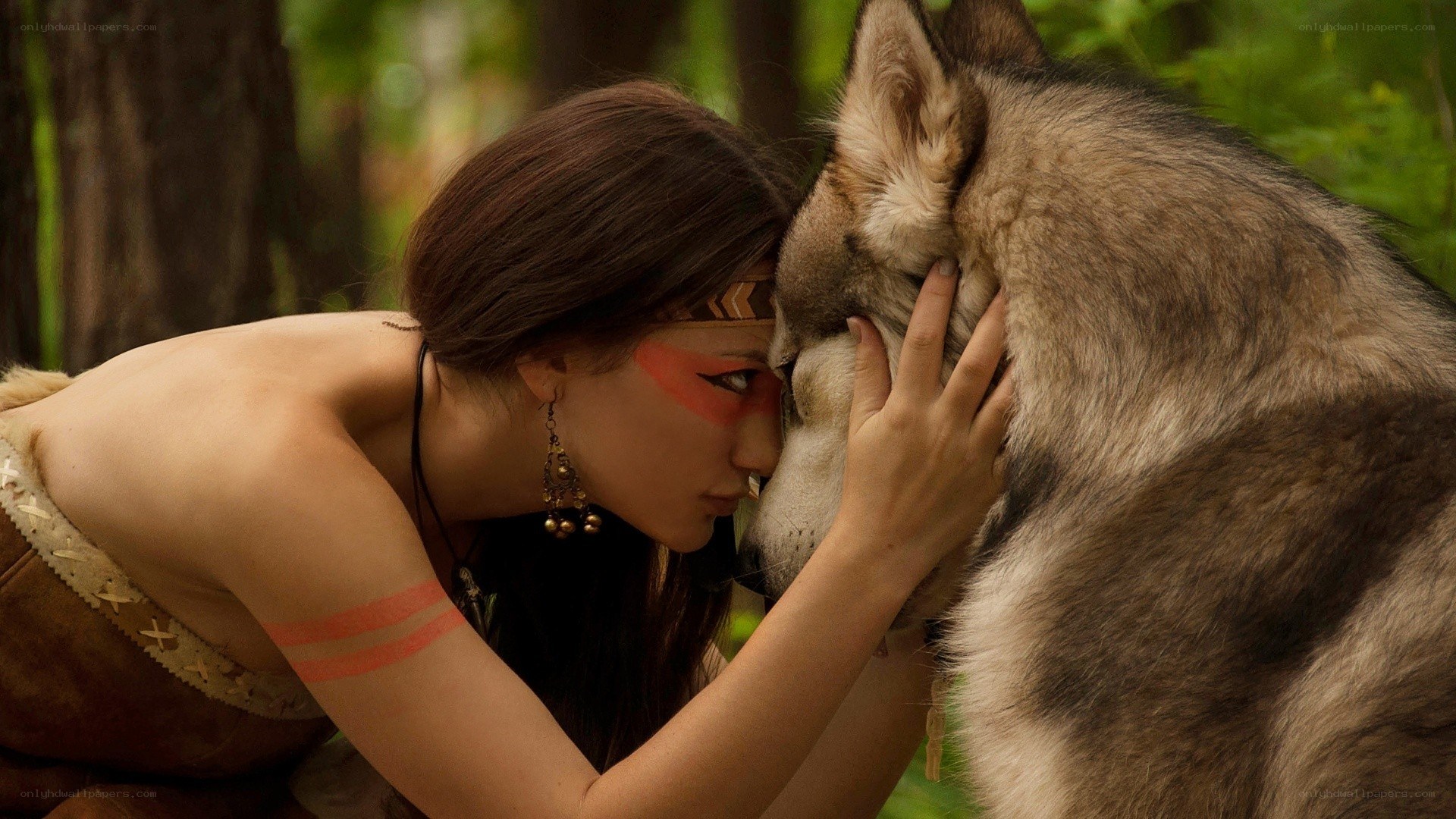 woman with wolf in forest