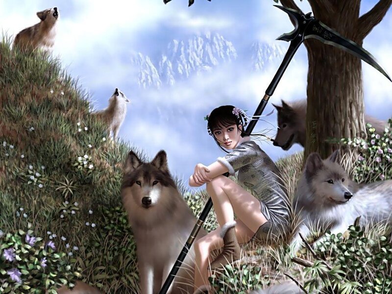Woman with wolves in mountains
