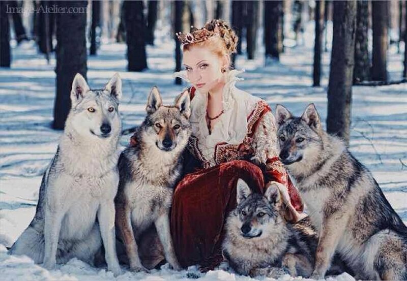 Woman with Wolves in Snow — White, Serene, Winter, Photograph, Forest