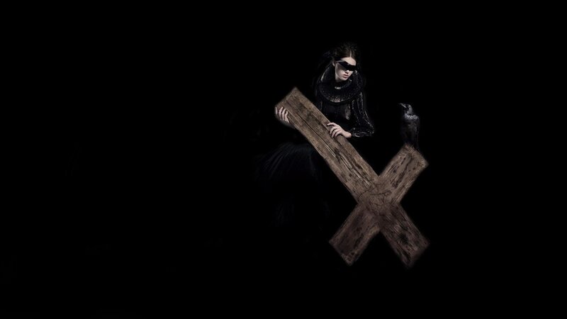 woman with wooden cross