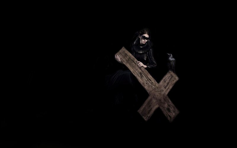 woman with wooden cross