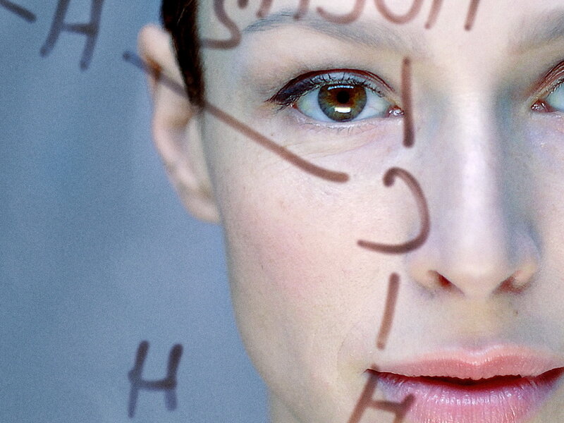 woman with writing on face
