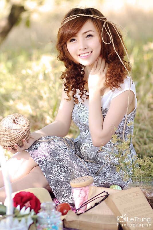 woman with yarn in field