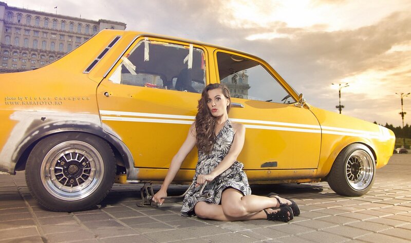 Woman with yellow car