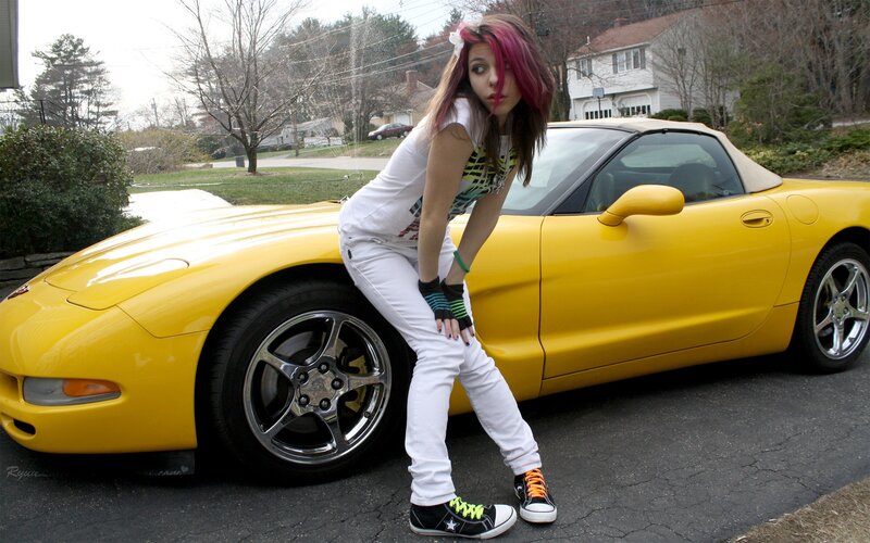 woman with yellow car