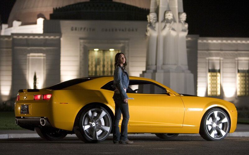 Woman with yellow car at observatory