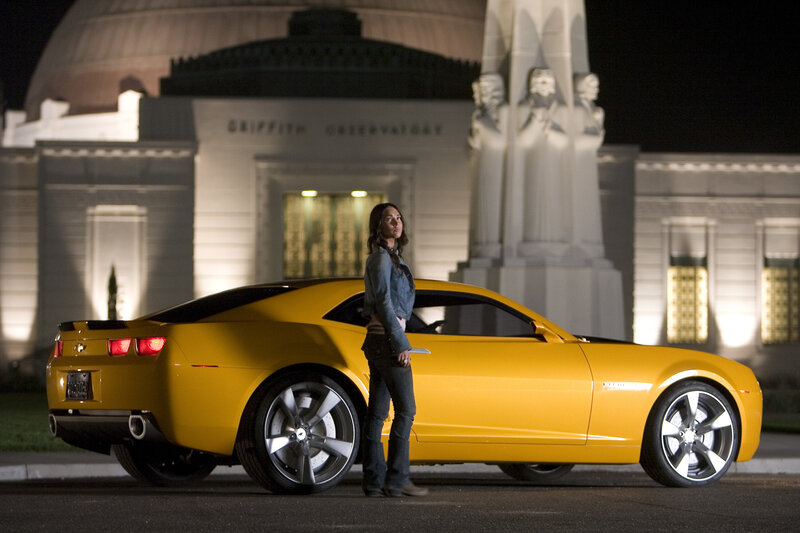 Woman with yellow car at observatory