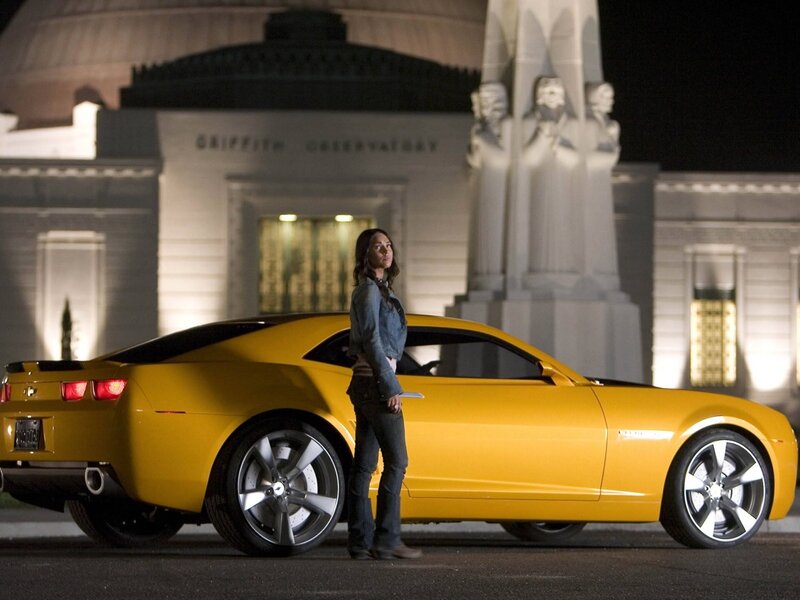 Woman with yellow car at observatory