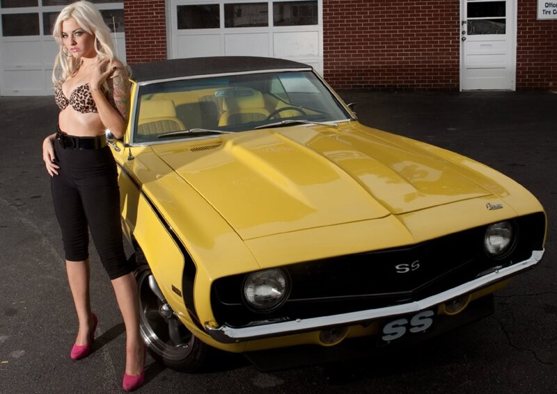 Woman with Yellow Car — Dramatic, Afternoon, Photograph, Building