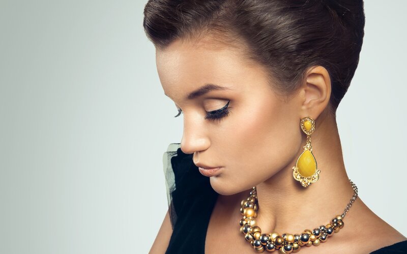 Woman with Yellow Earrings