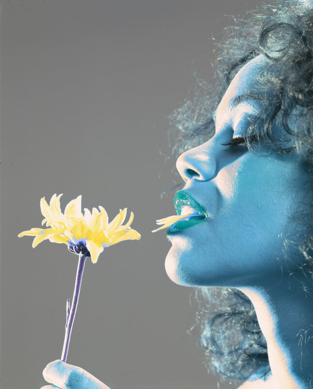 woman with yellow flower