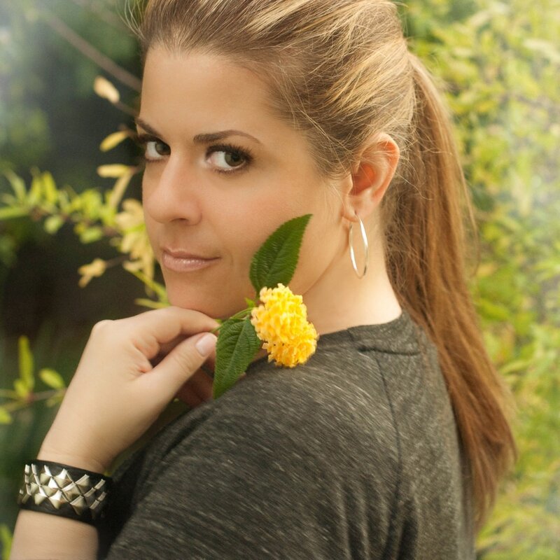 woman with yellow flower