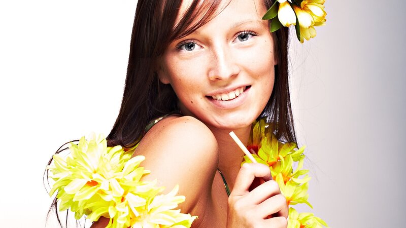 woman with yellow flower lei