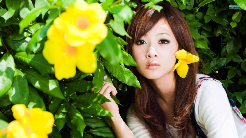Woman with Yellow Flower — Serene