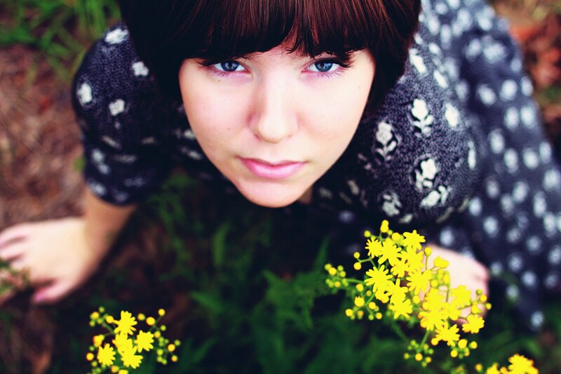 woman with yellow flowers
