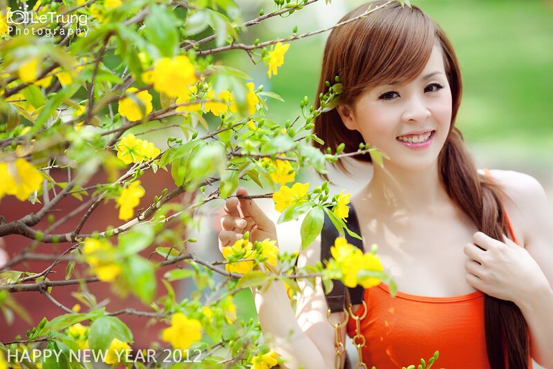 Woman with yellow flowers