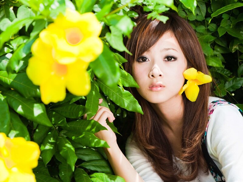 woman with yellow flowers