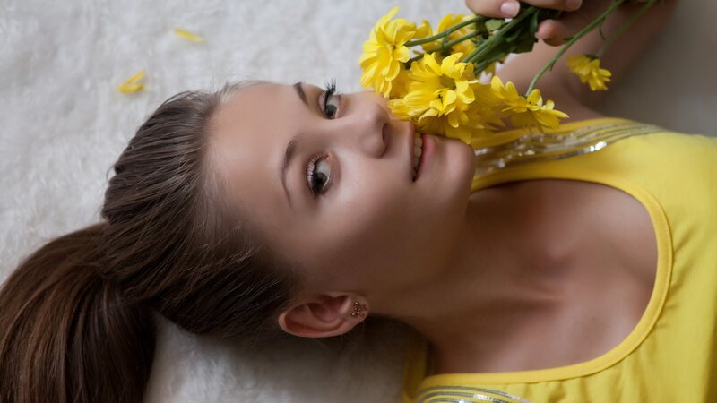woman with yellow flowers
