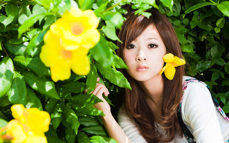 woman with yellow flowers