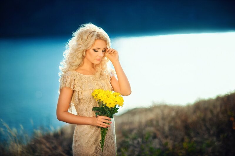 Woman with Yellow Flowers — Dramatic, Sunset