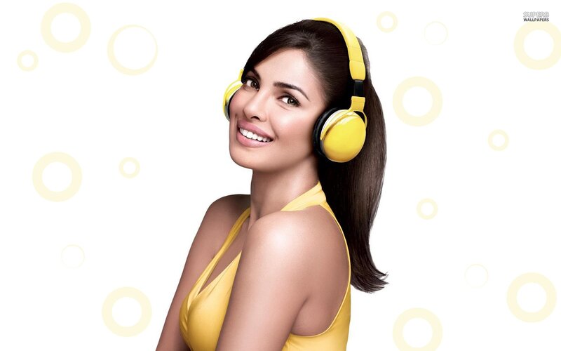 woman with yellow headphones