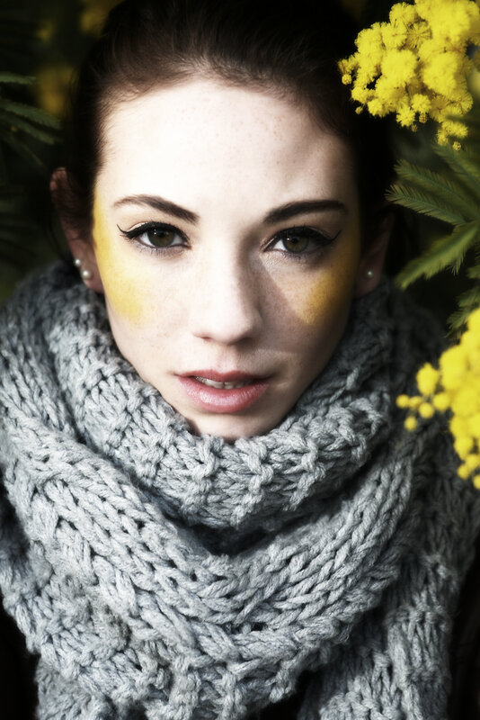 woman with yellow makeup and scarf