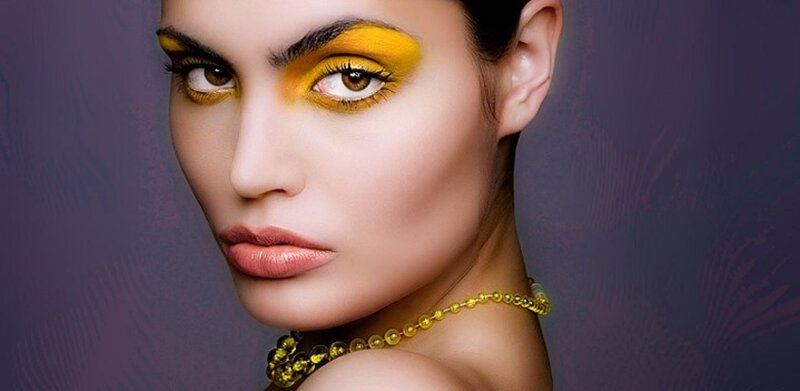 Woman with Yellow Makeup — Dramatic