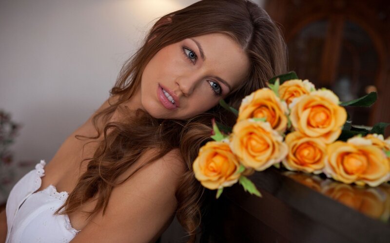 woman with yellow roses