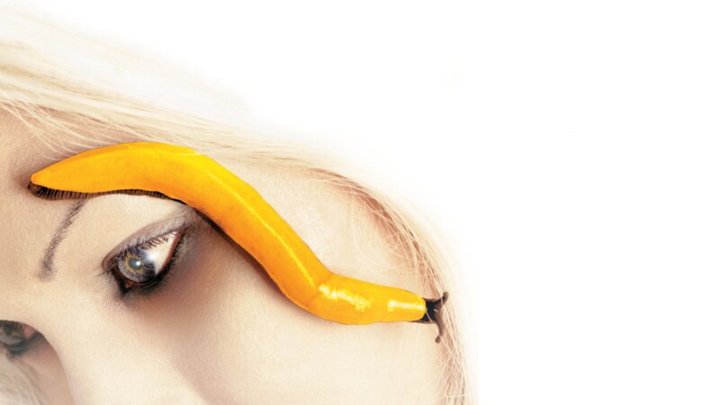 woman with yellow slug on face