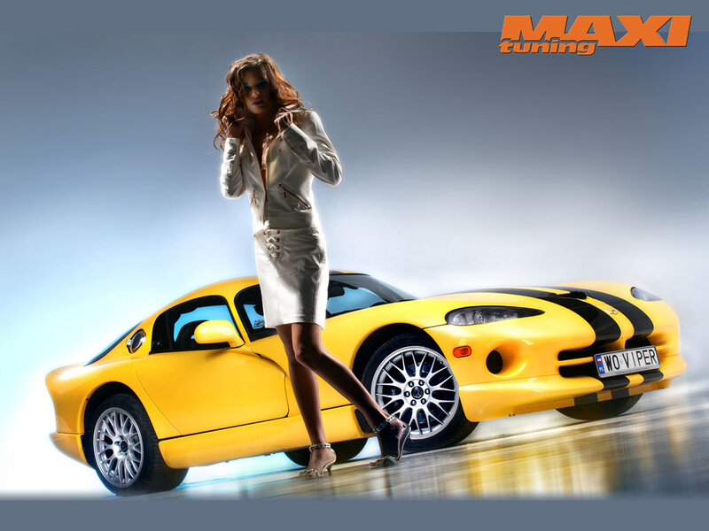 Woman with yellow sports car