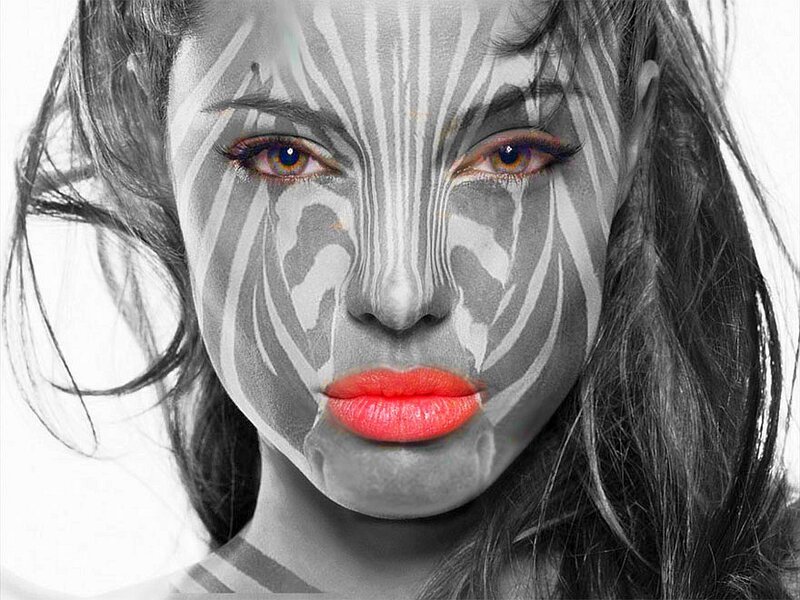 woman with zebra face paint