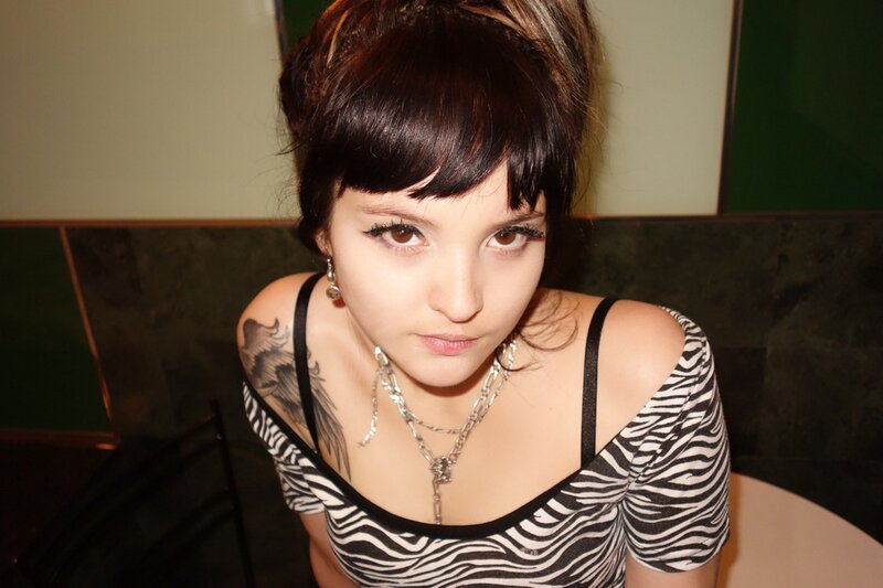 woman with zebra print top
