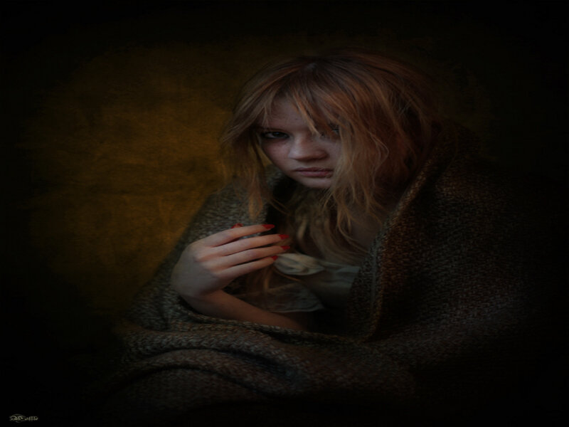 woman wrapped in a blanket