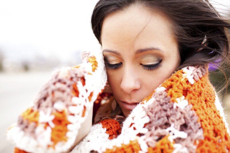 woman wrapped in a blanket