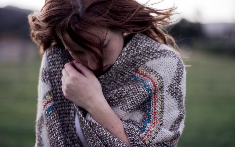 woman wrapped in a blanket
