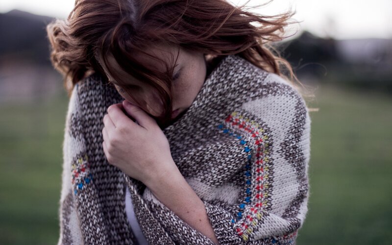 woman wrapped in a scarf