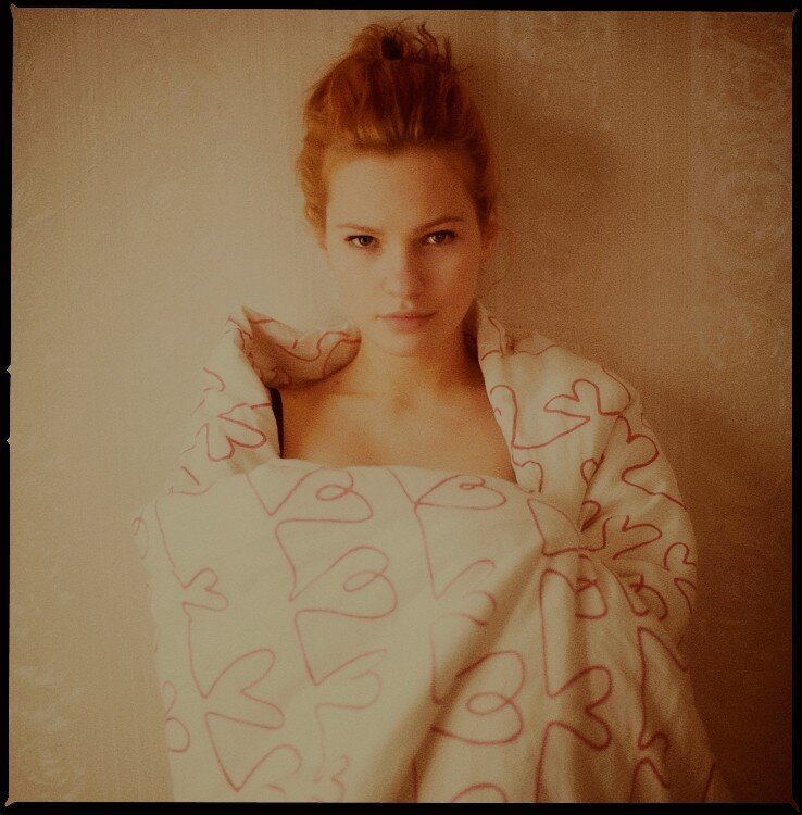 woman wrapped in blanket