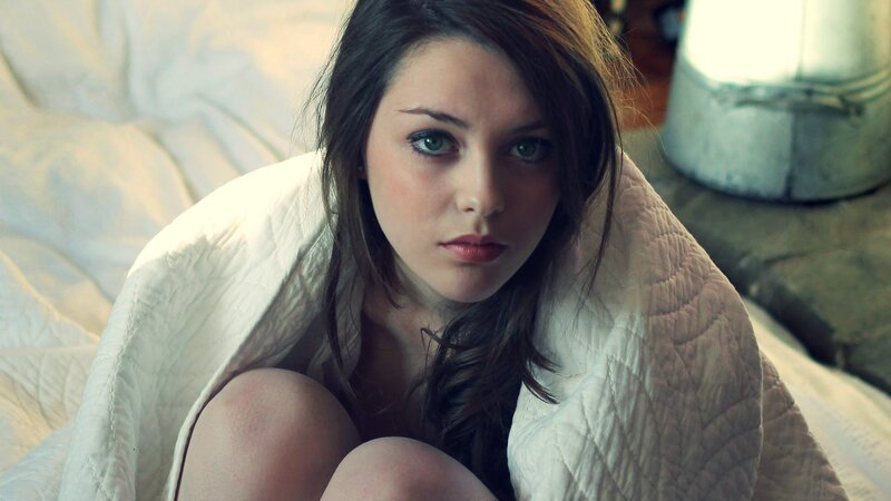 woman wrapped in blanket