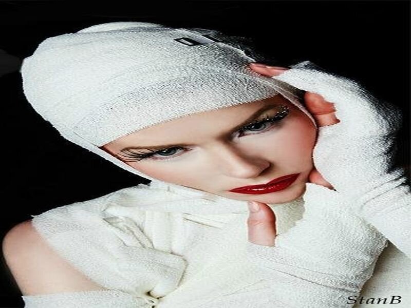 woman wrapped in white bandages