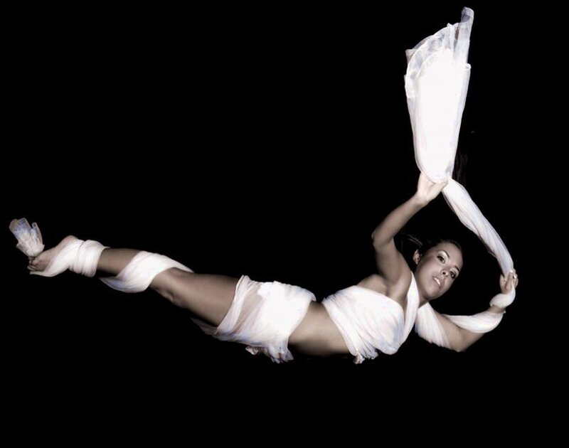 Woman Wrapped in White Fabric — Dramatic