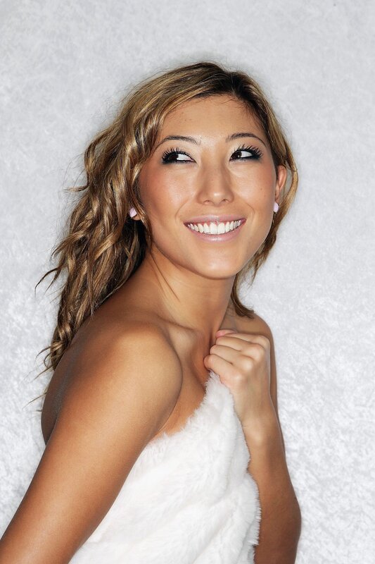 woman wrapped in white towel