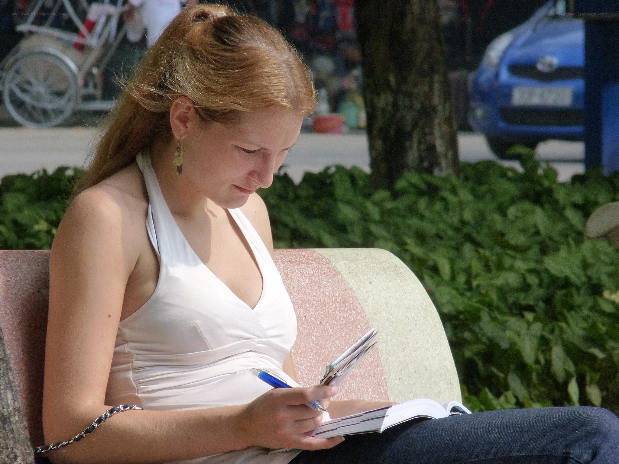 woman writing in notebook