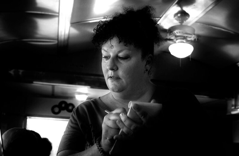Woman Writing in Notebook — Black