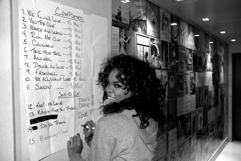 woman writing on a whiteboard