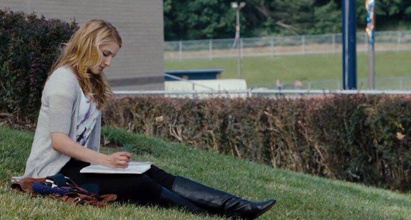 Woman Writing on Grass